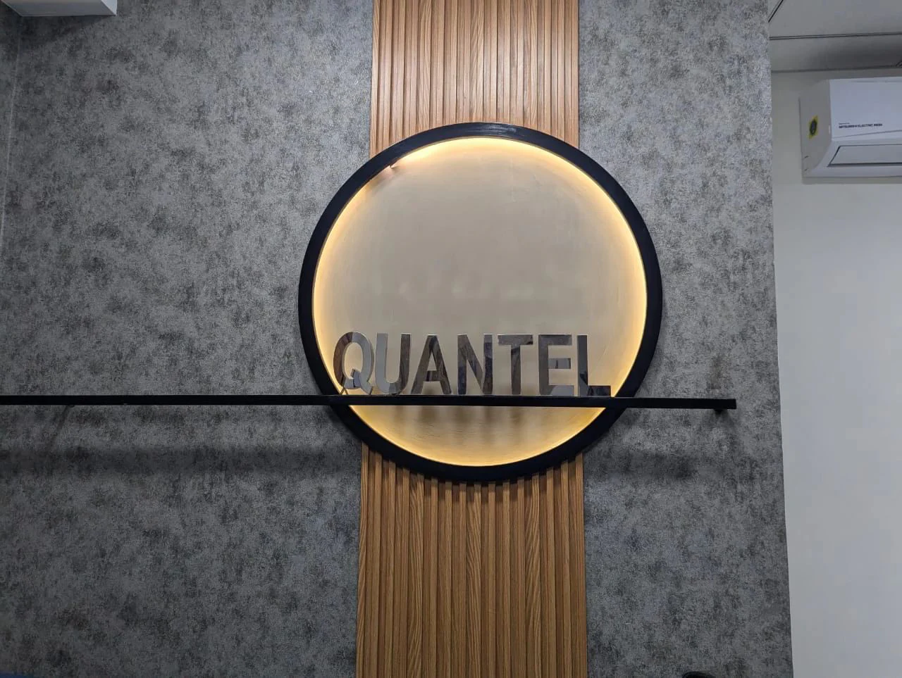 Reception wall at the Quantel office in West Patel Nagar